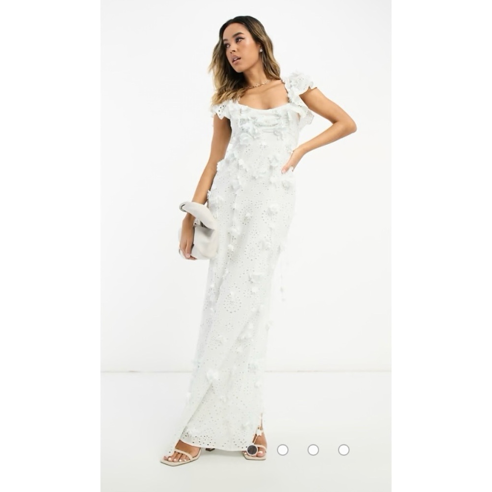 ASOS DESIGN puff sleeve eyelet cut out midi dress with floral corsage detail